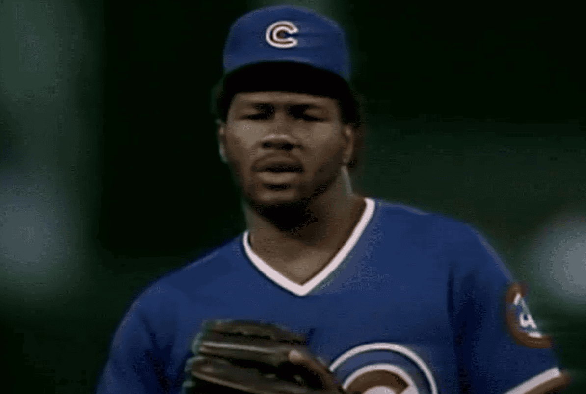 Lee Smith delivering a pitch, representing his legacy as a top closer in baseball.
